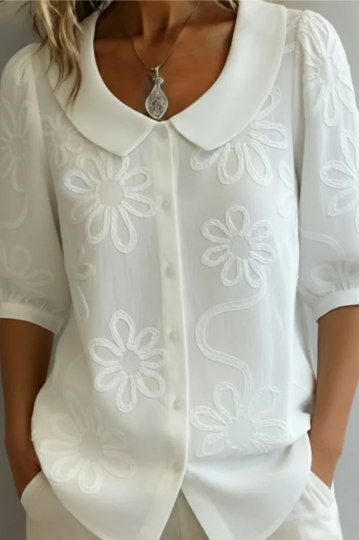 Fiorella – Blusa con cuello floral